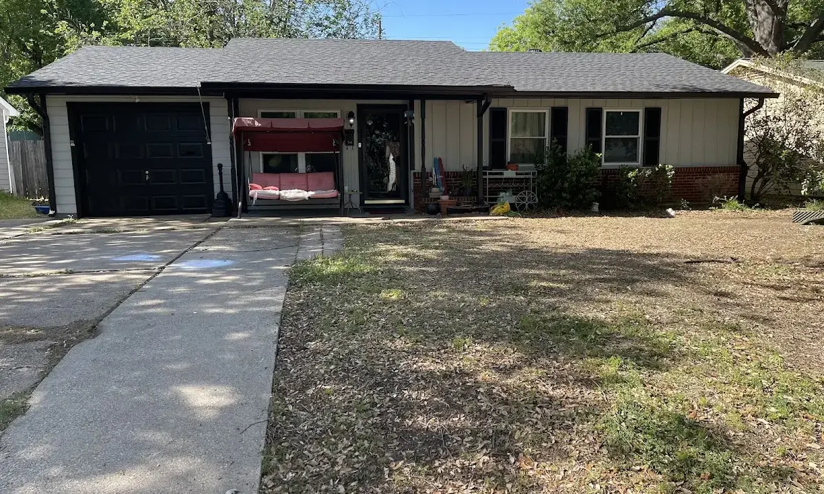 Asphalt Shingle Roof Repair crew at work on a residential roof in Osceola